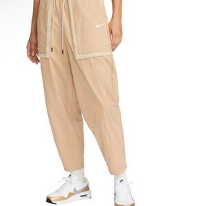 Nike Women's Woven Pants Sherpa Pocket Trim Drawstring Casual Athleisure Tan